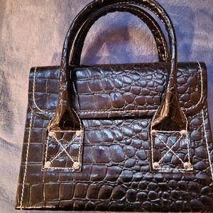 Black purse coupon organizer